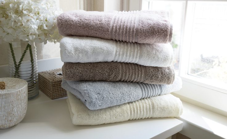 fancy fur towel sets placed in bathroom-cum-spa 